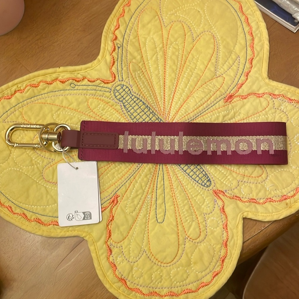 Lululemon Never lost keychain